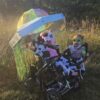 Child in a Cow Abducted by Aliens costume on wheels