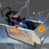 Child in a Back to the Future costume on wheels