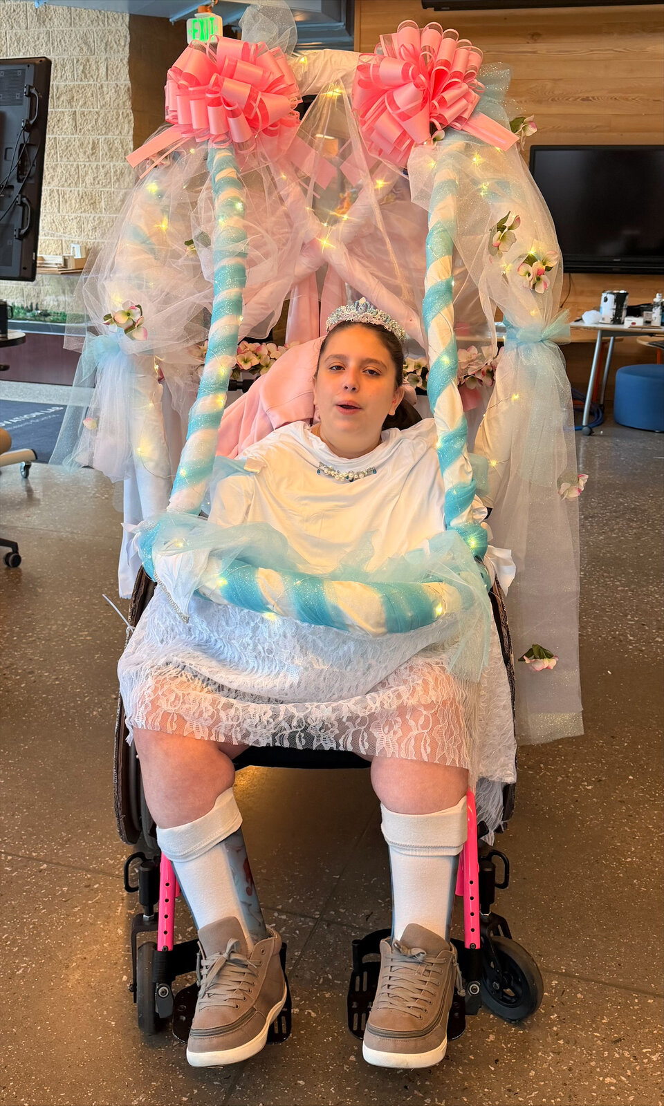 Child in a Cinderella in Carriage costume on wheels