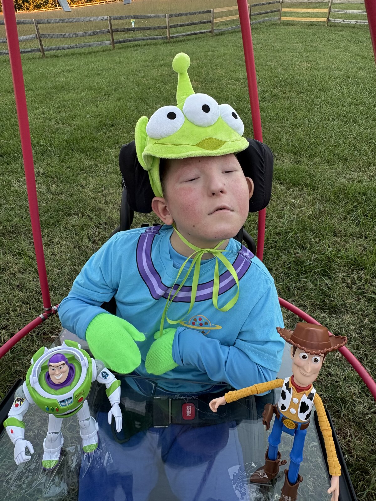 Child in a Claw Machine costume on wheels
