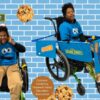 Child in a Cookie Monster costume on wheels