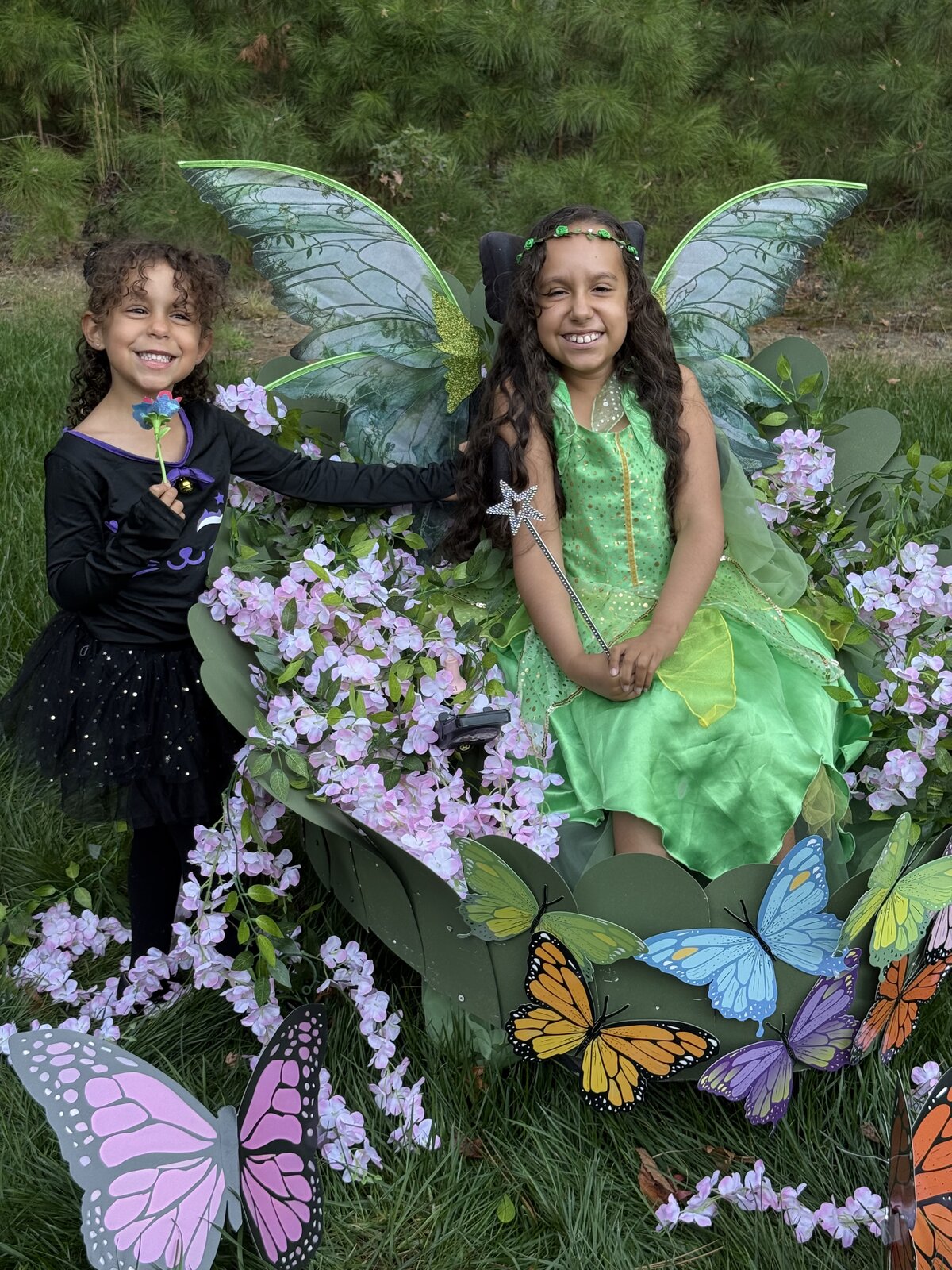 Child in a Fairy in a Leaf costume on wheels