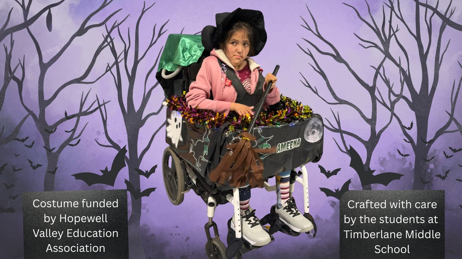 Child in a Witch costume on wheels