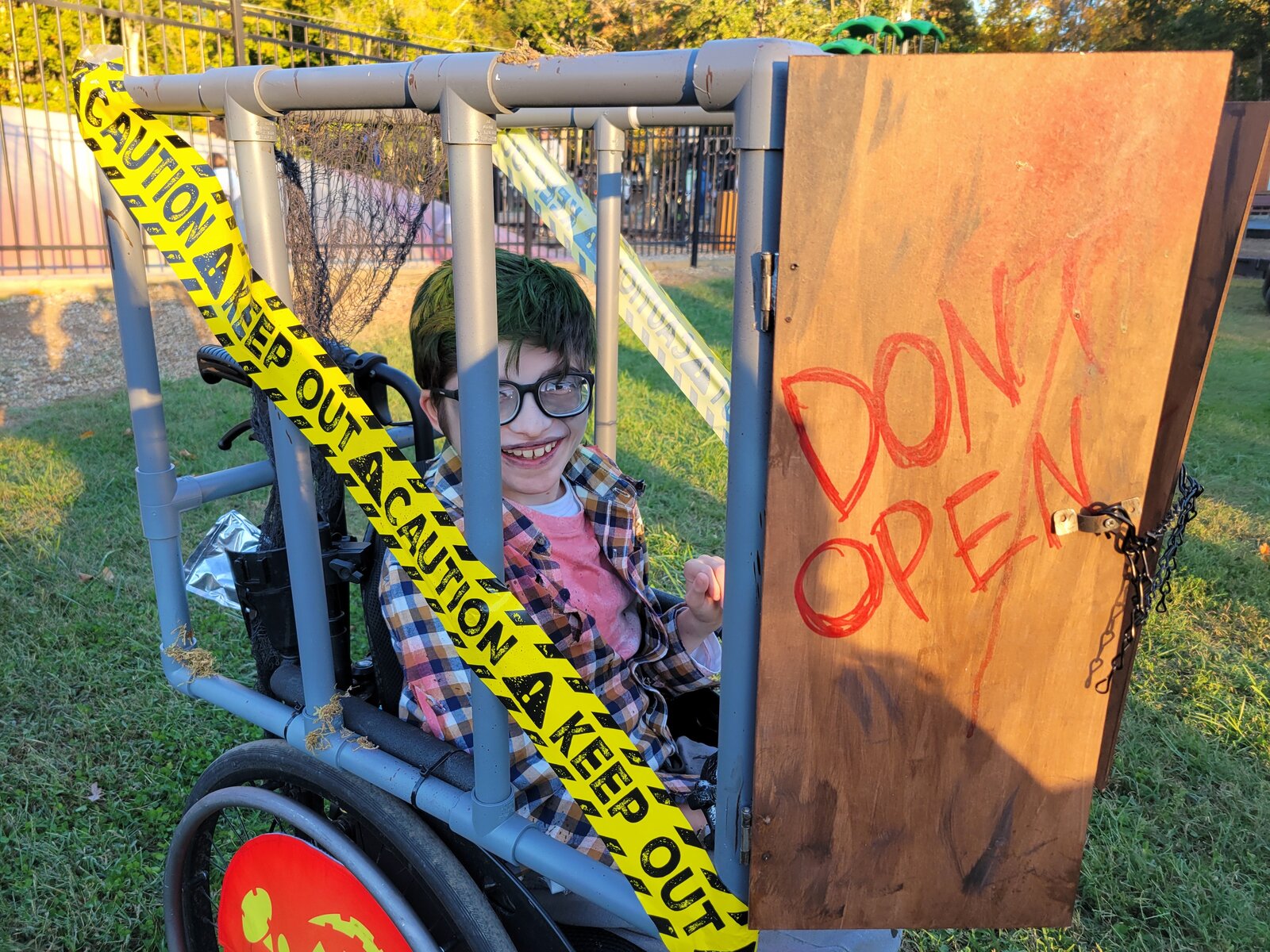 Child in a Zombie costume on wheels