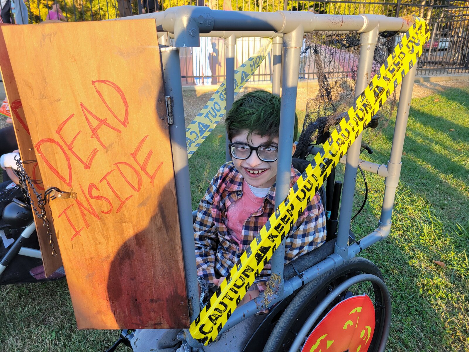Child in a Zombie costume on wheels
