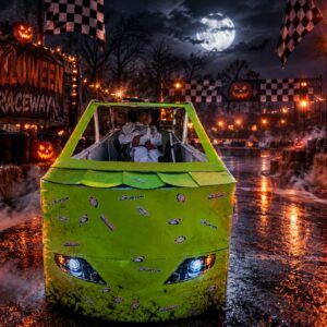 Child in a Number 55 costume on wheels